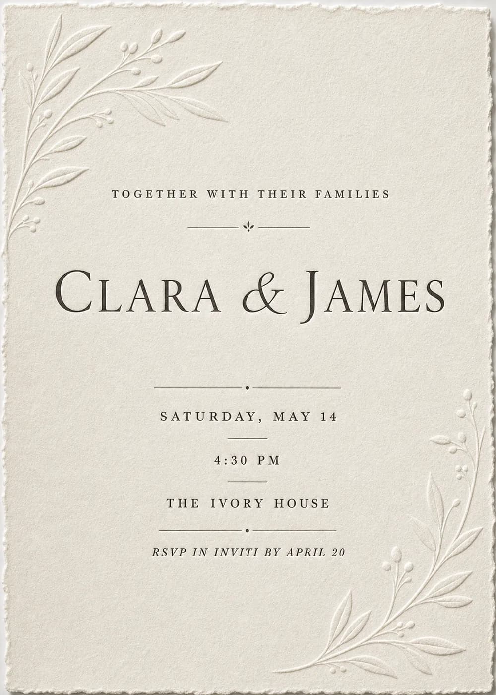 Ivory letterpress wedding invitation on deckle-edged paper with blind-embossed leafy branches and berries in opposite corners and black serif type