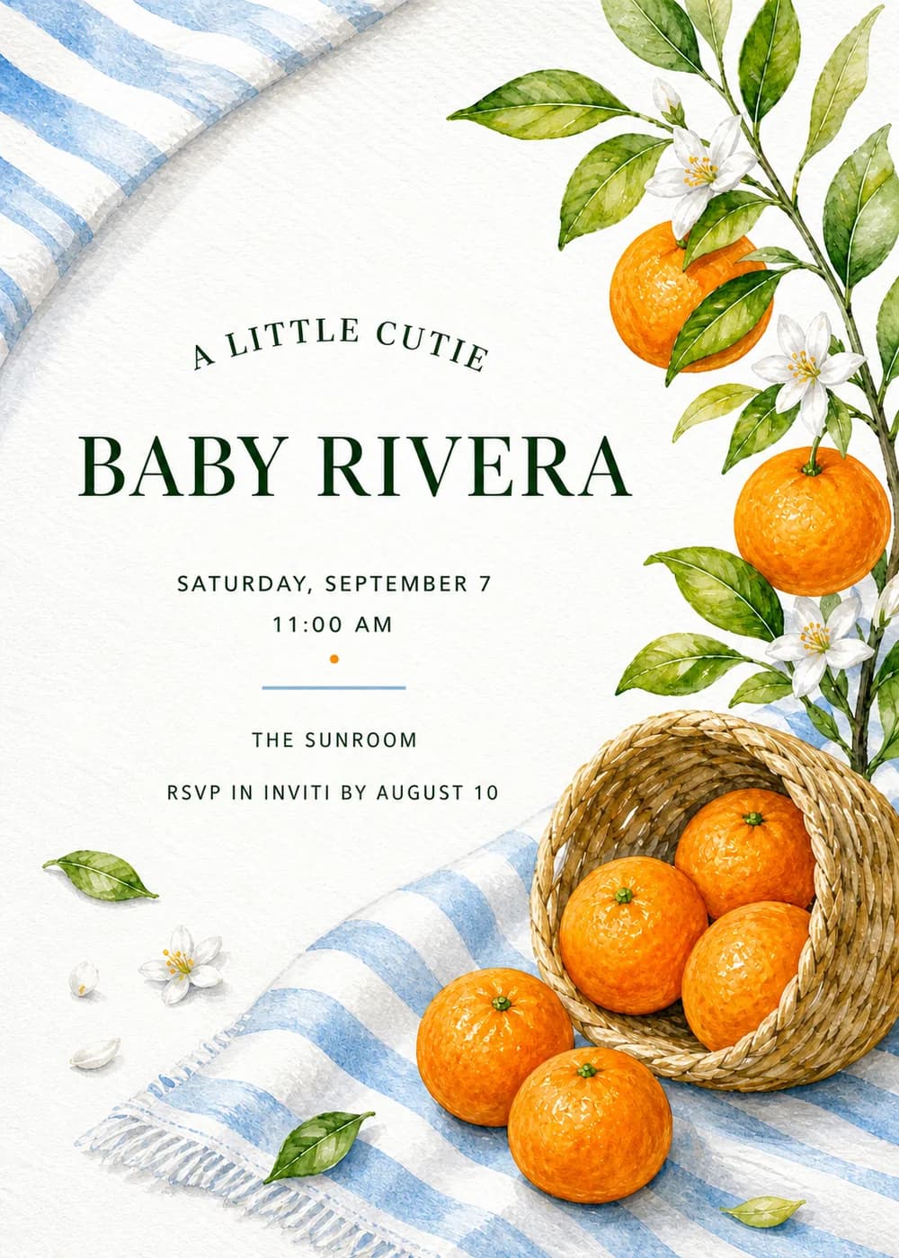 A Little Cutie baby shower invitation with watercolor oranges, orange blossoms and green leaves, a woven basket of oranges and a blue striped picnic cloth